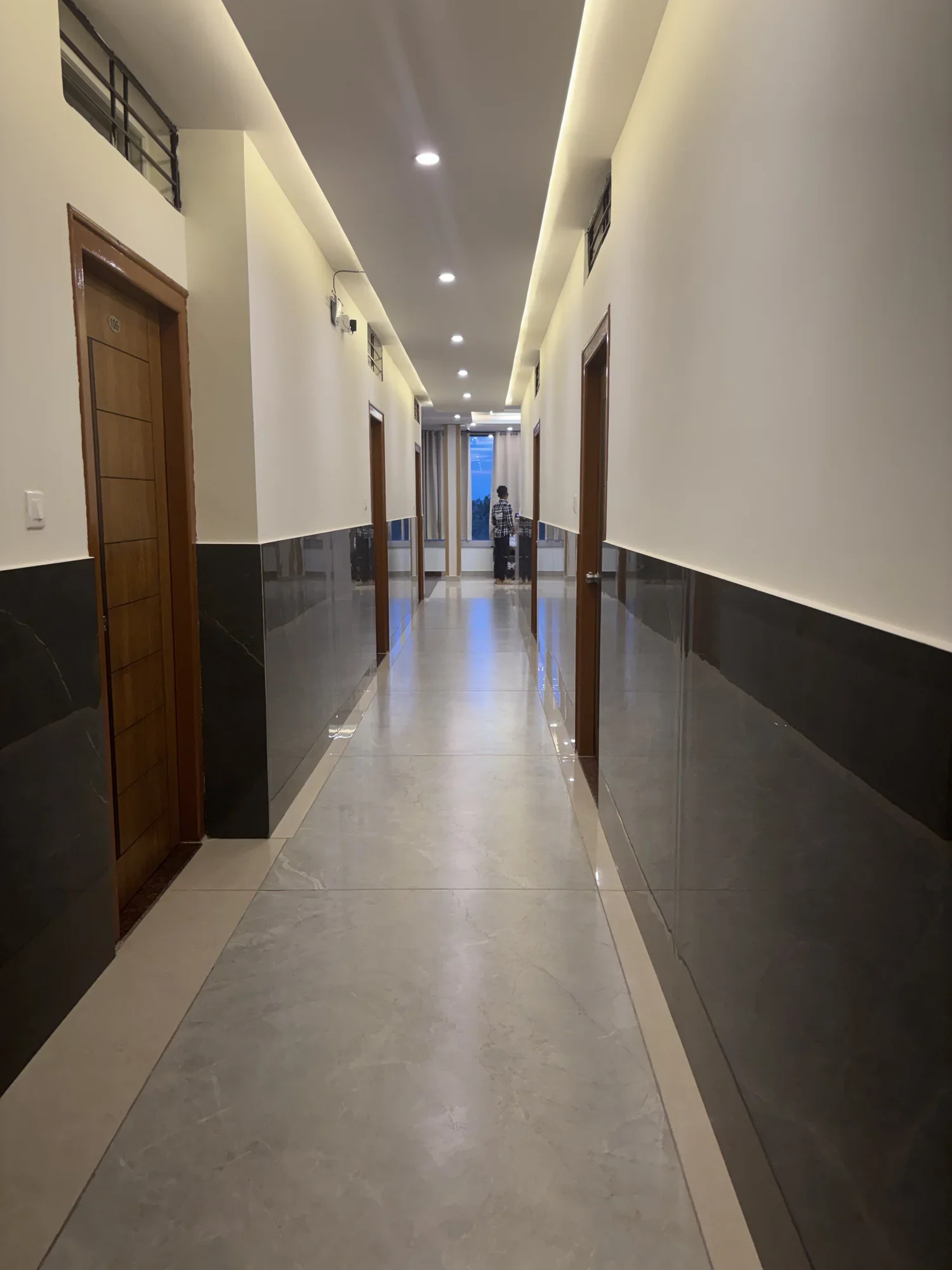 Well-lit guest floor corridor